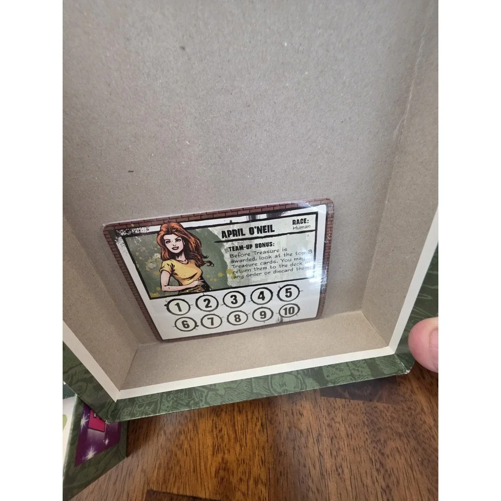 Teenage Mutant Ninja Turtles Nickolodeon Munchkin Card Game missing some pieces